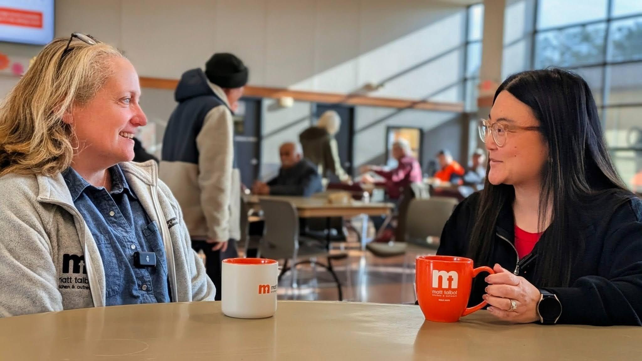 Left to right: Matt Talbot Director of Marketing and Communication Susie Wilson and Executive Director Alynn Sampson talk in the dining room on April 10, 2026. (Brittany Wren, Stingray Writing)