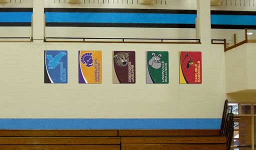 School gym with conference team boards, custom signs, display conference teams