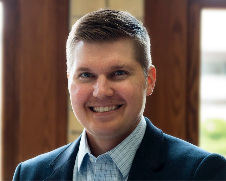 Mr. Brett J. Folga