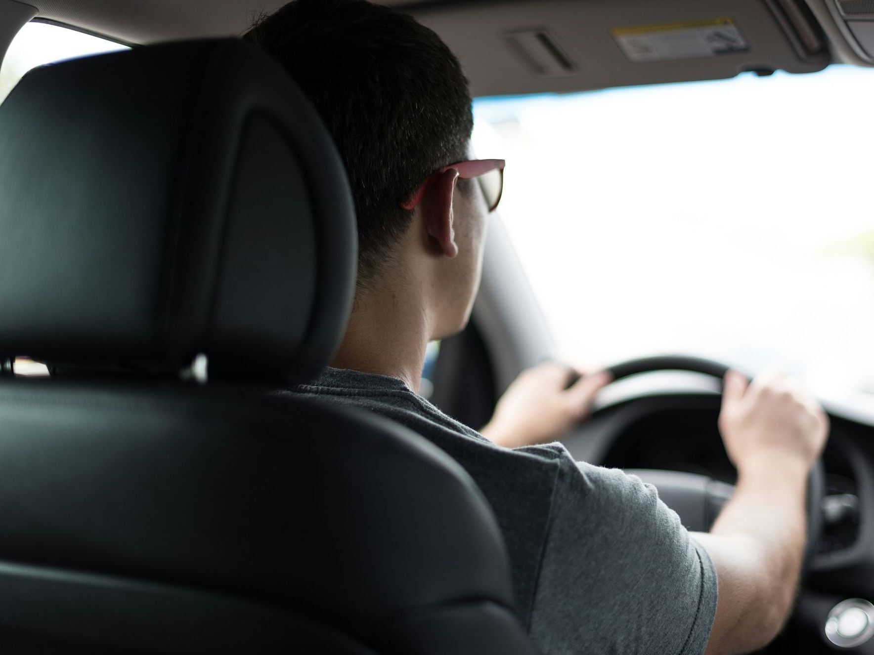 Man driving a car