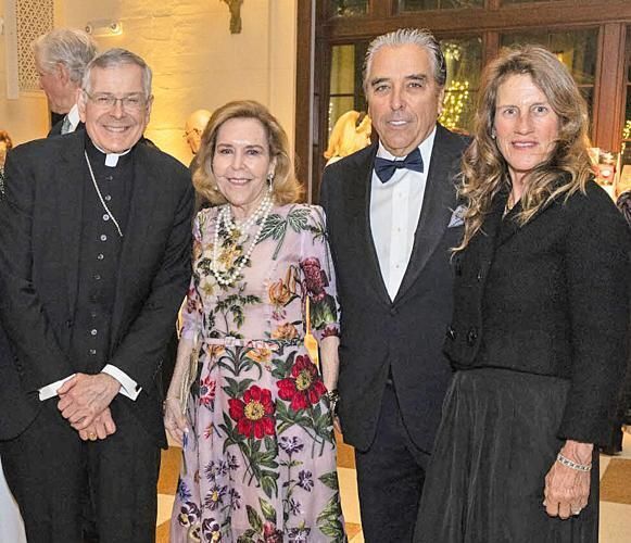 Bishop Gerald M. Barbarito, left, stands with Catholic Charities benefactors Lian, Andres Fanjul and Catherine Fanjul