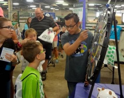 Colin teaching Michigan 4-H youth about the life skills wheel.