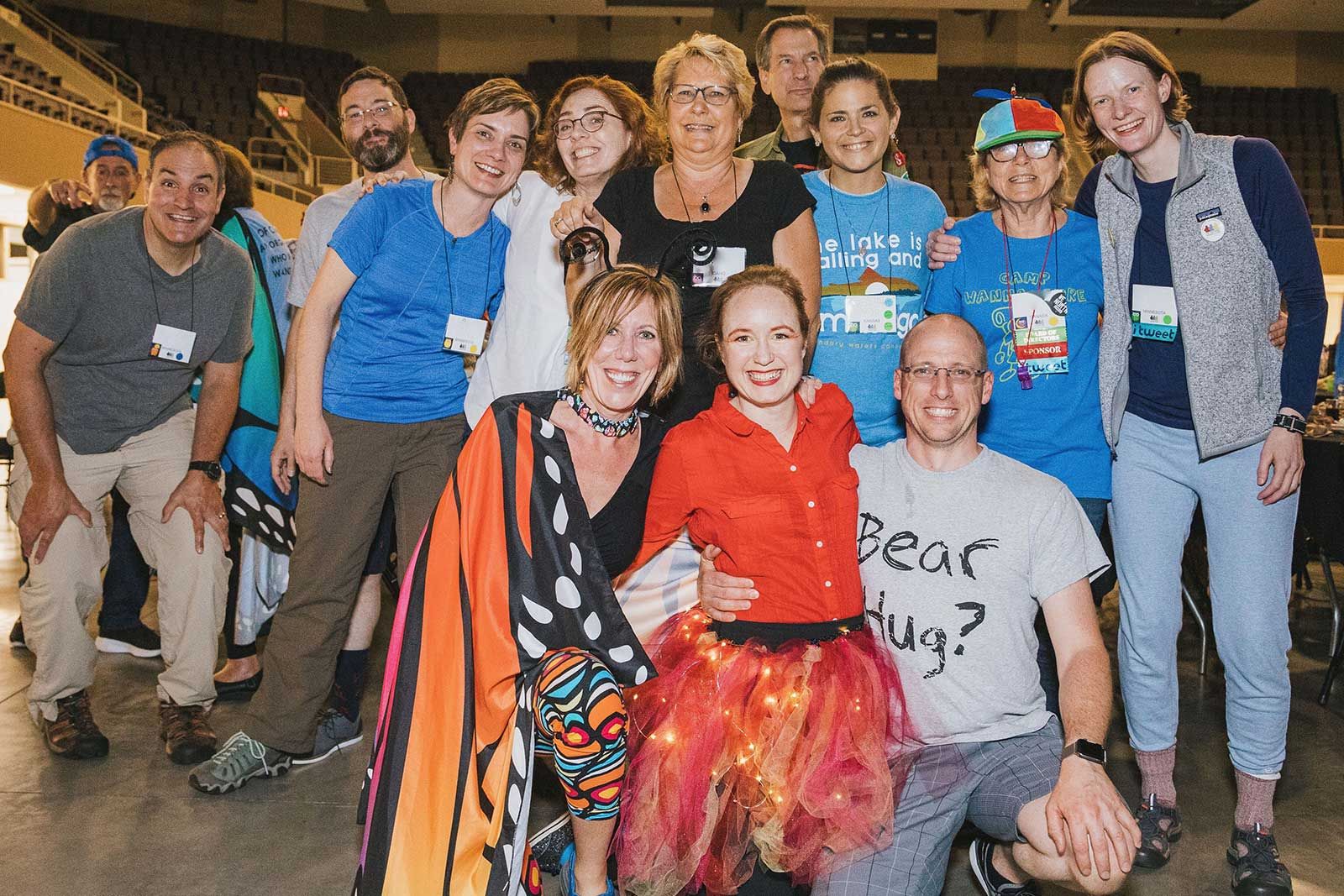 A group of costumed PSC Partners conference attendees pose for the camera