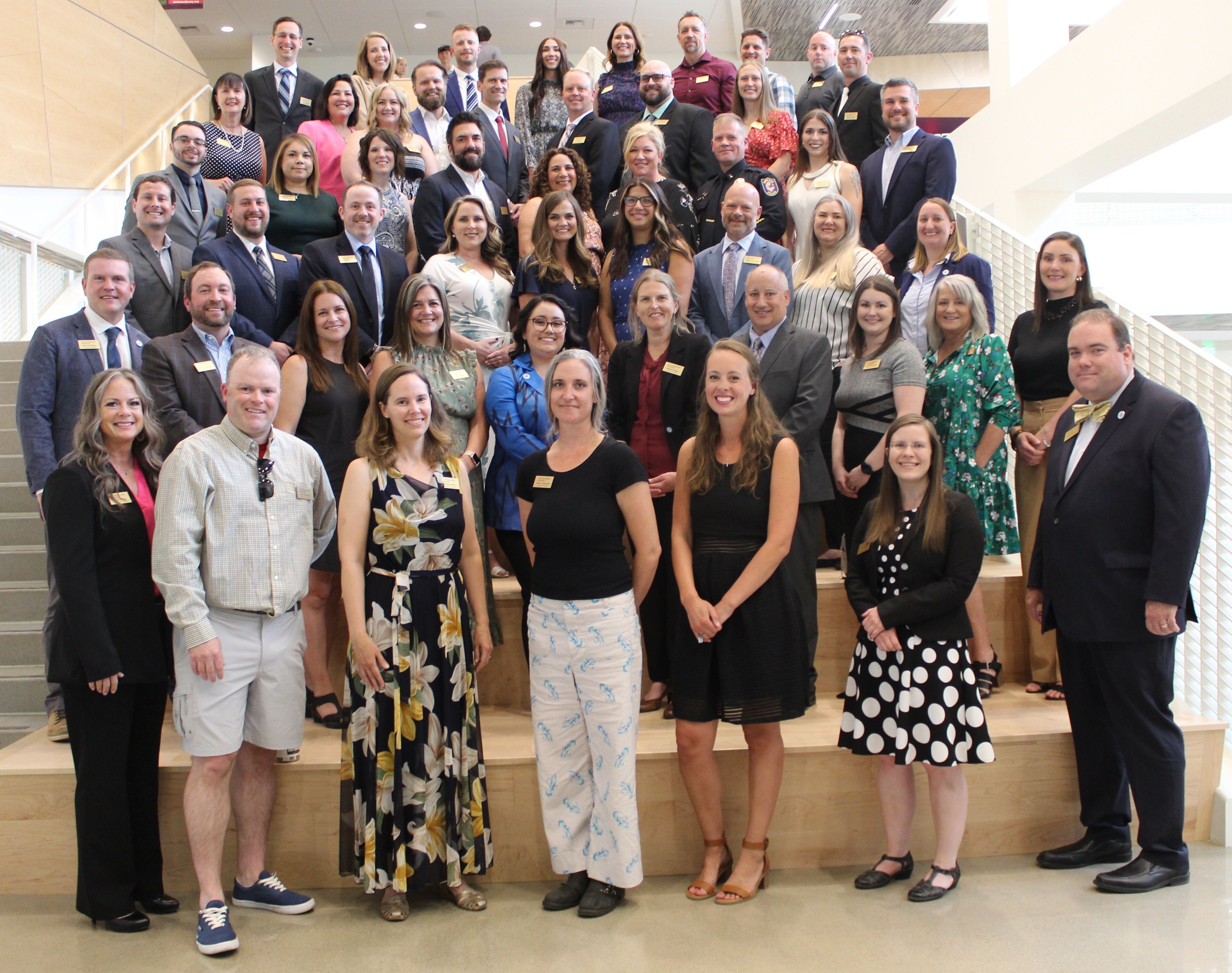 A group of people posing for a group photo