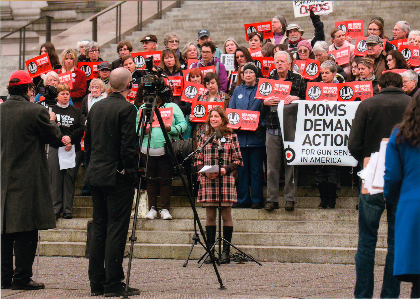 Tana speaking at a demonstration against gun violence.