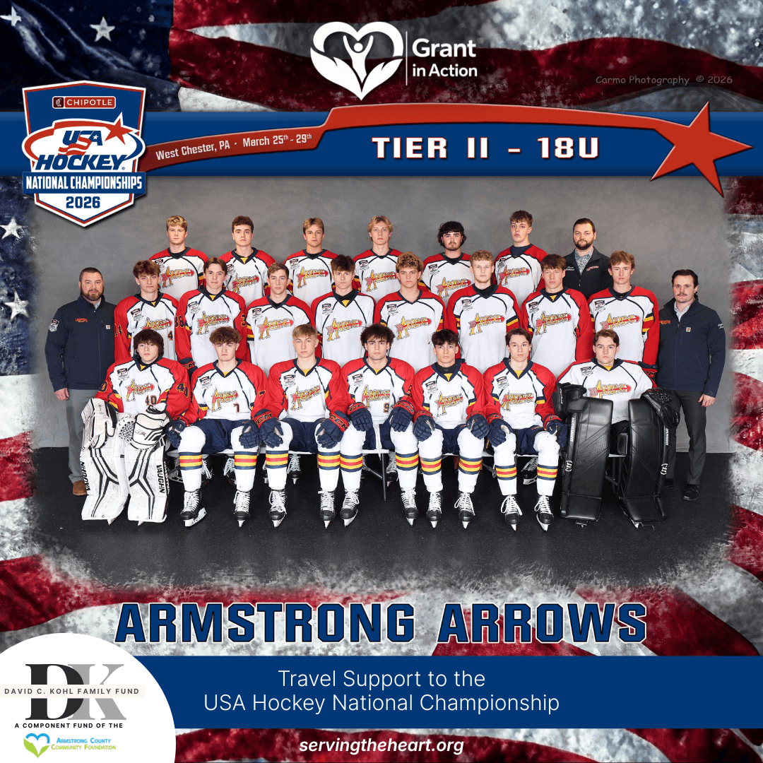 18U hockey team posing together at the USA Hockey National Championship, supported by a grant from the David C. Kohl Family Fund, a component fund of the Armstrong County Community Foundation, providing travel assistance.