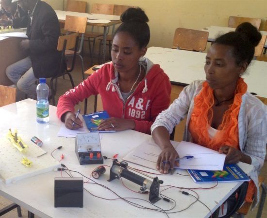 Women learning science.