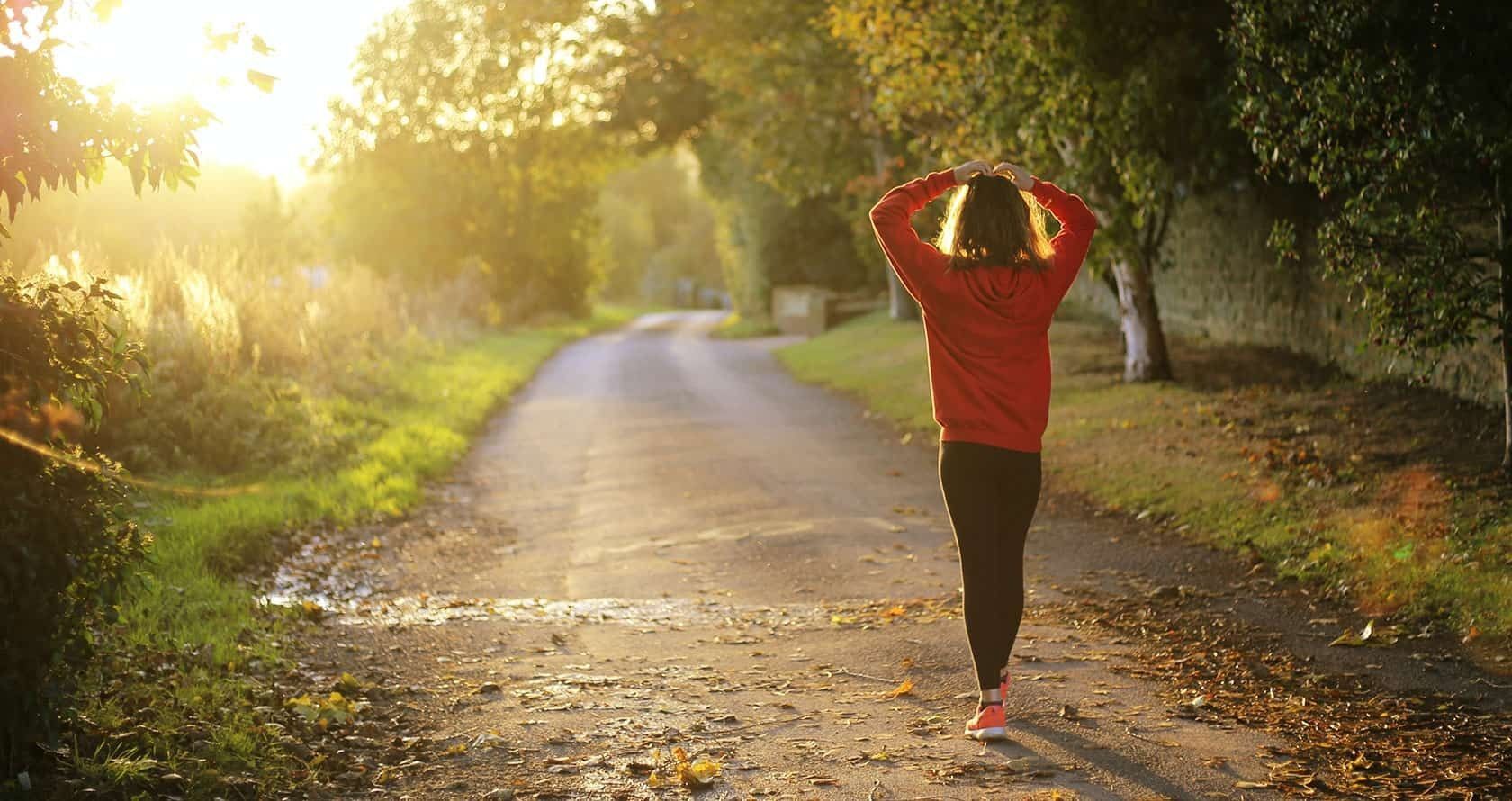 Walking on Path at Sunrise