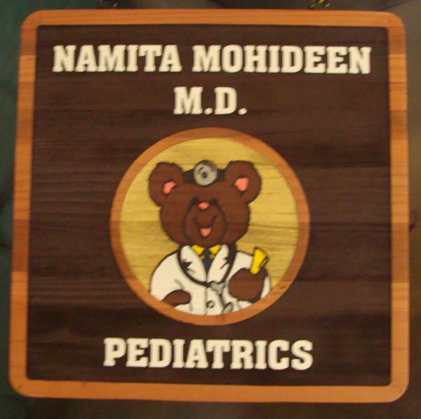 B11027 – Carved and Sandblasted  Redwood Sign for Pediatrics Office, with Picture  Of Teddy Bear as Doctor