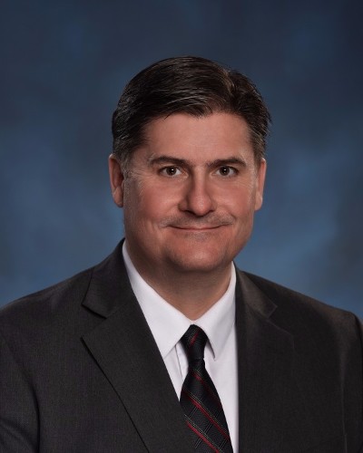 Adam C. Bratton, Executive Director