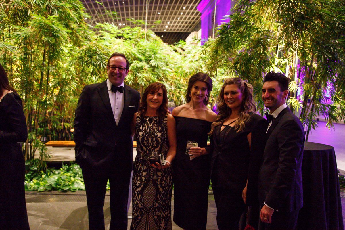 An image of Nancy Corderman, Alan Pinto, Rebecca Alexander, and Tori and Mike Banu. They are all standing in the atrium of the Cleveland Museum of Art. 