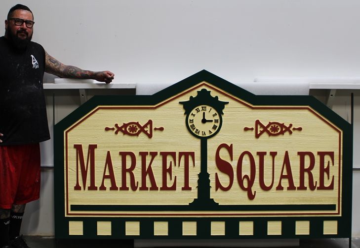 K20371 - Carved Western Red Cedar Entrance Sign for the Market Square Residential Community, 2-5-D  with Street Clock