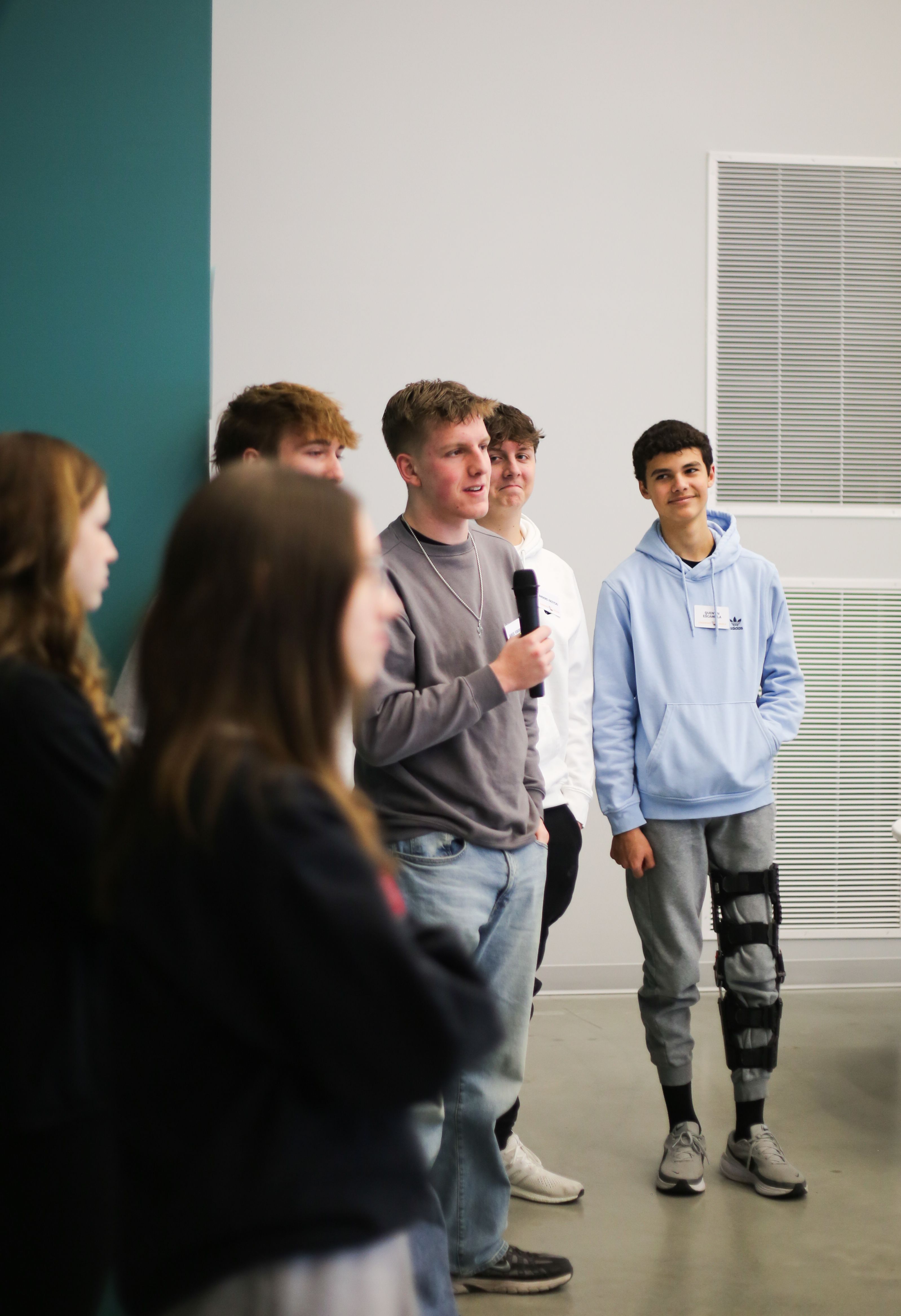 Youth Leadership Lincoln student speaks in front of his peers.