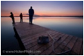 This is a picture of the sunset off a dock