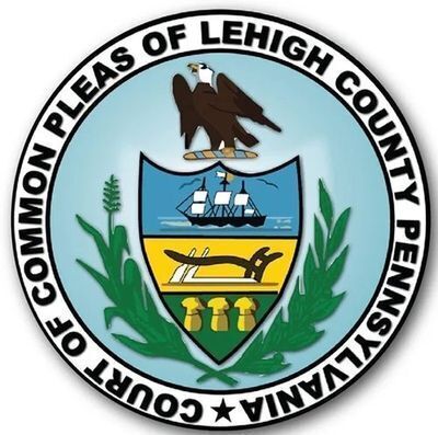 The Circuit Court for Frederick County, MD Seal – A colorful emblem featuring Lady Justice standing beside a ship and trade goods, symbolizing law, commerce, and maritime heritage within the jurisdiction of Frederick County, Maryland.