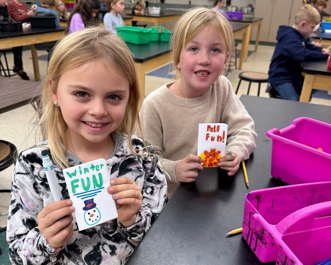 elementary art students with zines they created