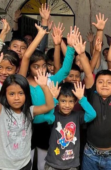 Children raising hands