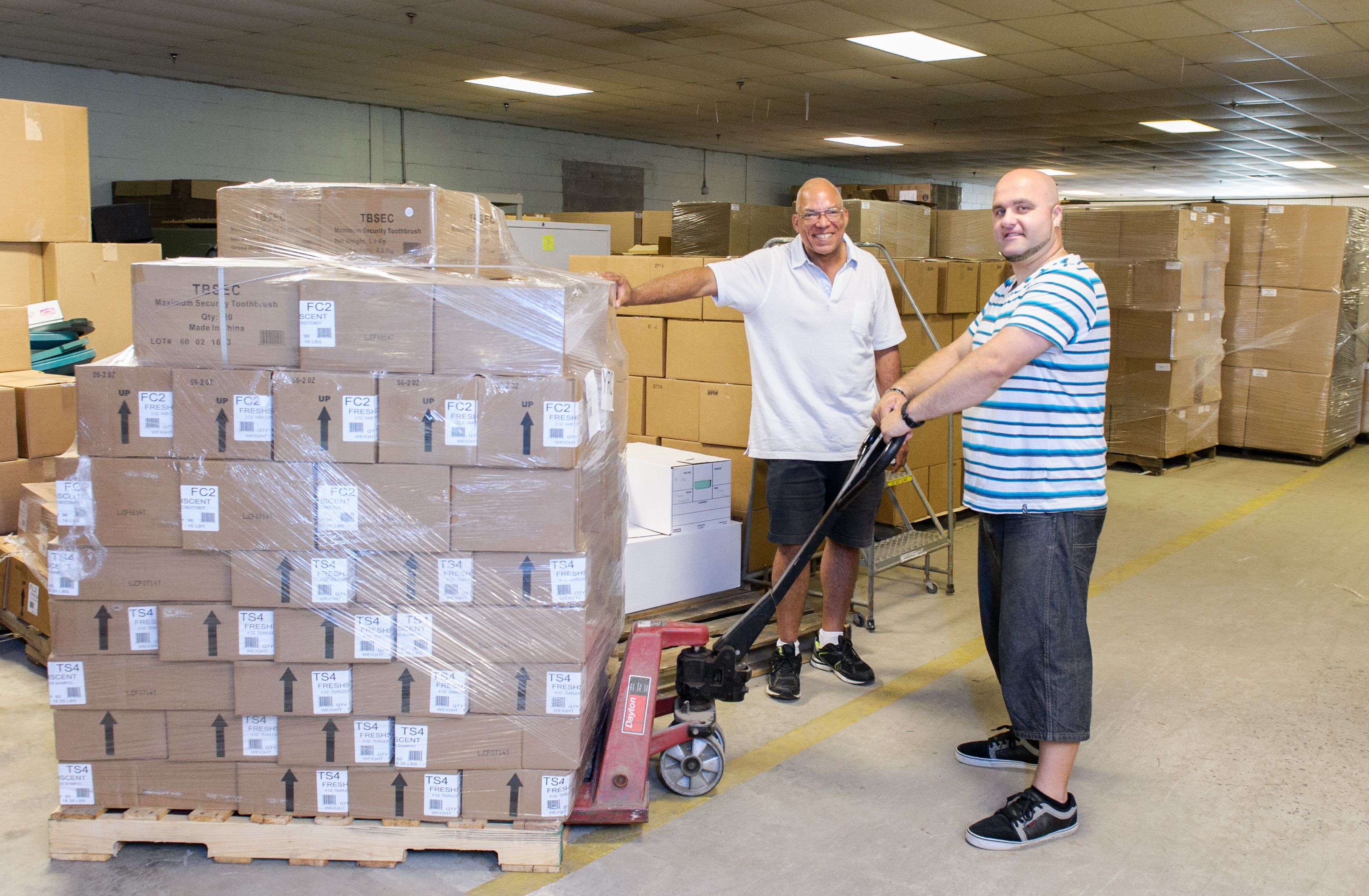 Joe handles a pallet of packages ready to be delivered.