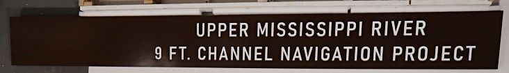 G16082A - Carved and Sandblasted Sign for "Upper Mississippi River 9 Ft. Channel Navigation Project"