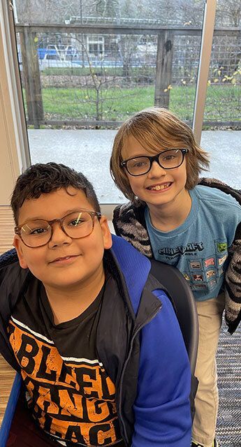 Two smiling boys.