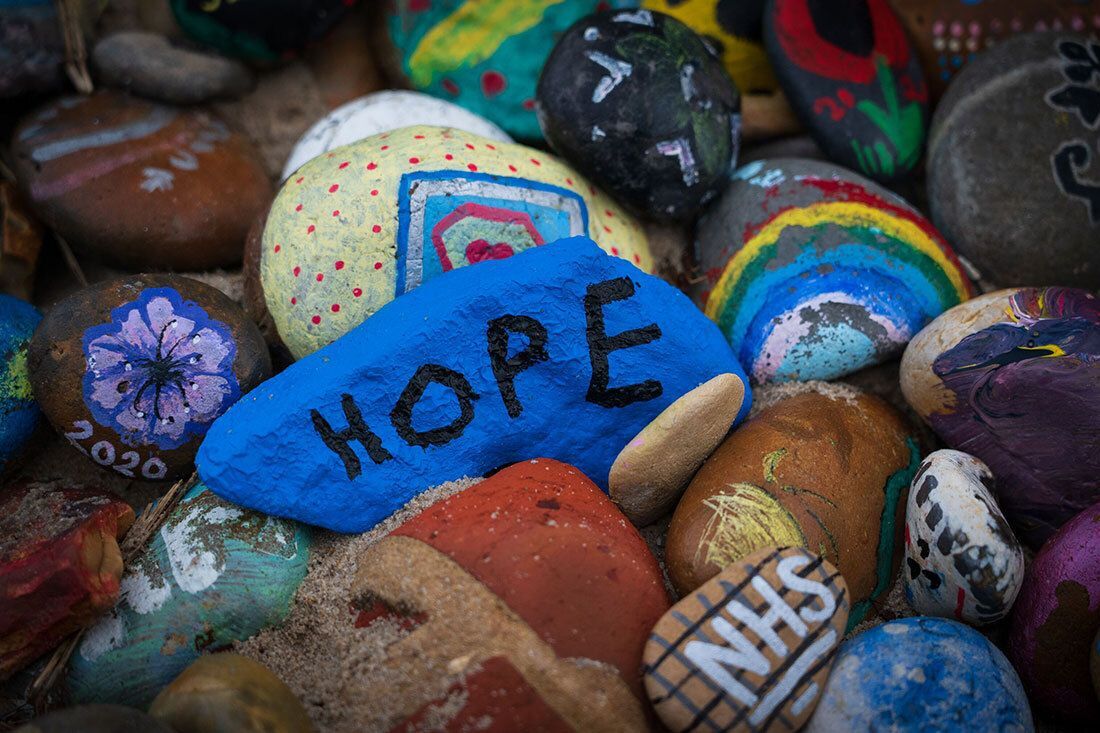 Blue rock that says Hope