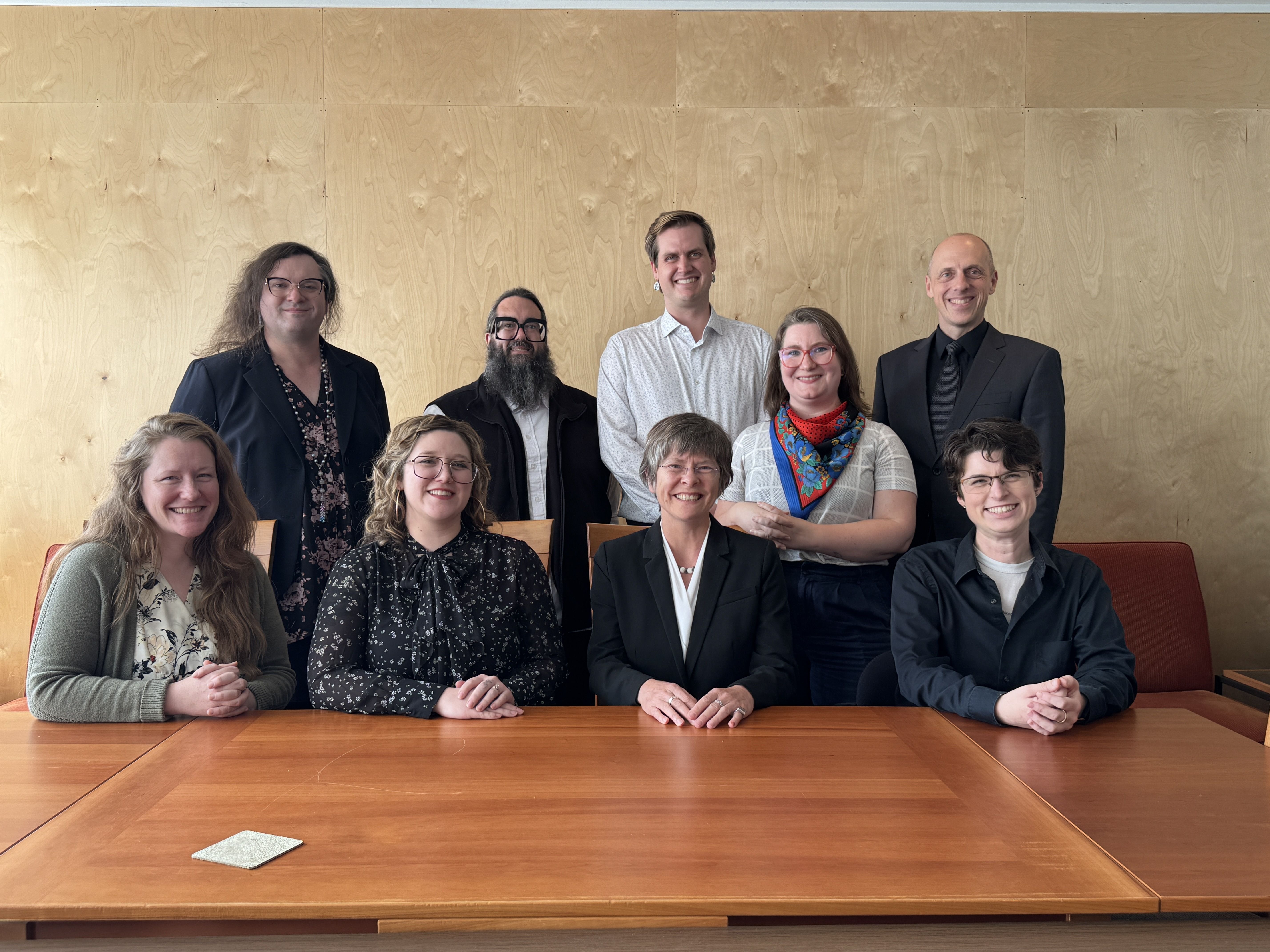 Mother duck follows her three baby ducks