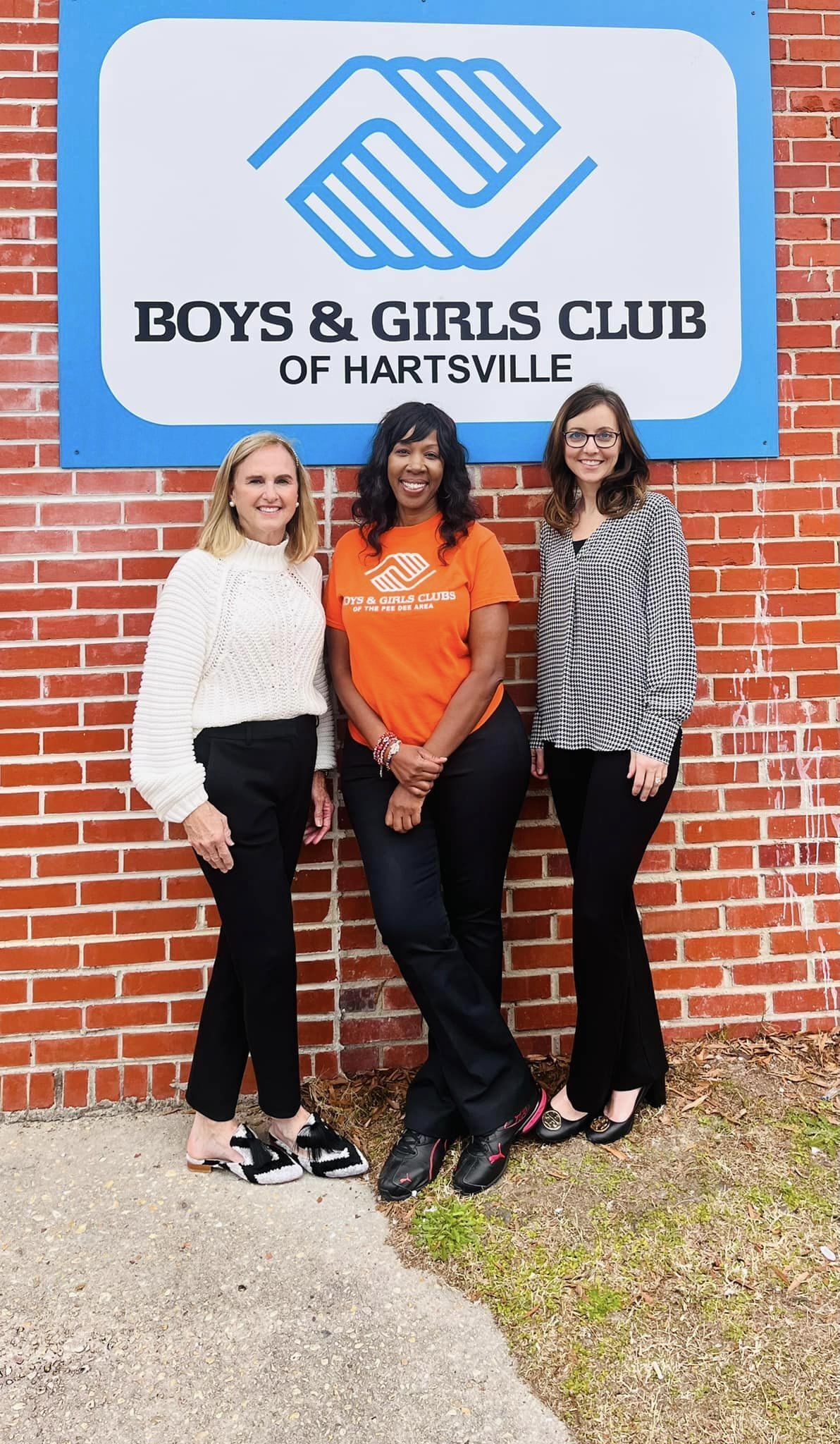 Hartsville Boys & Girls Club Director Dianne Montgomery provides a tour of the facility to The Byerly Foundation staff.