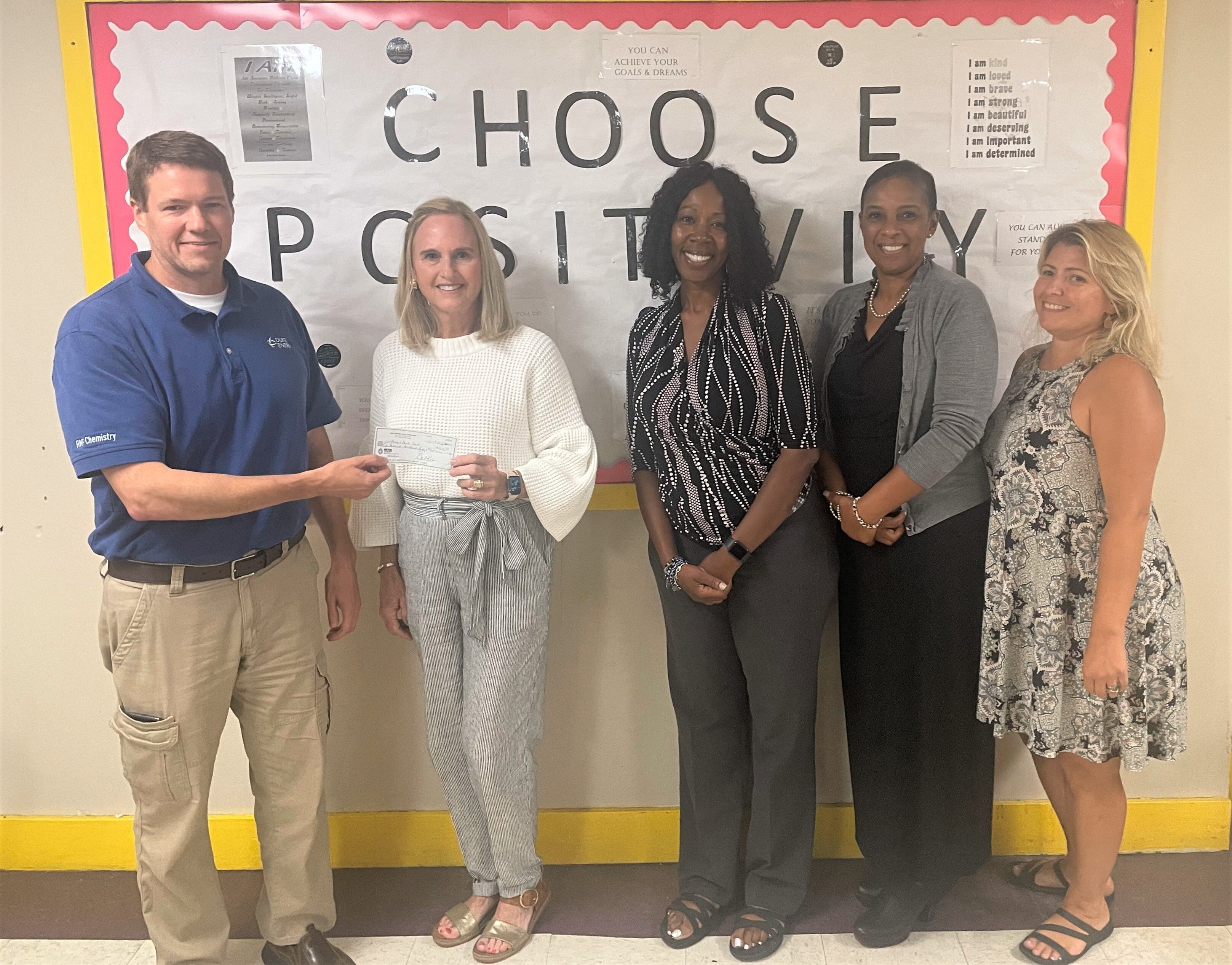 Duke Energy’s Keith McDonald presents Hartsville Boys & Girls Club Board Chair Kathy Brown with a $1,250 donation. 