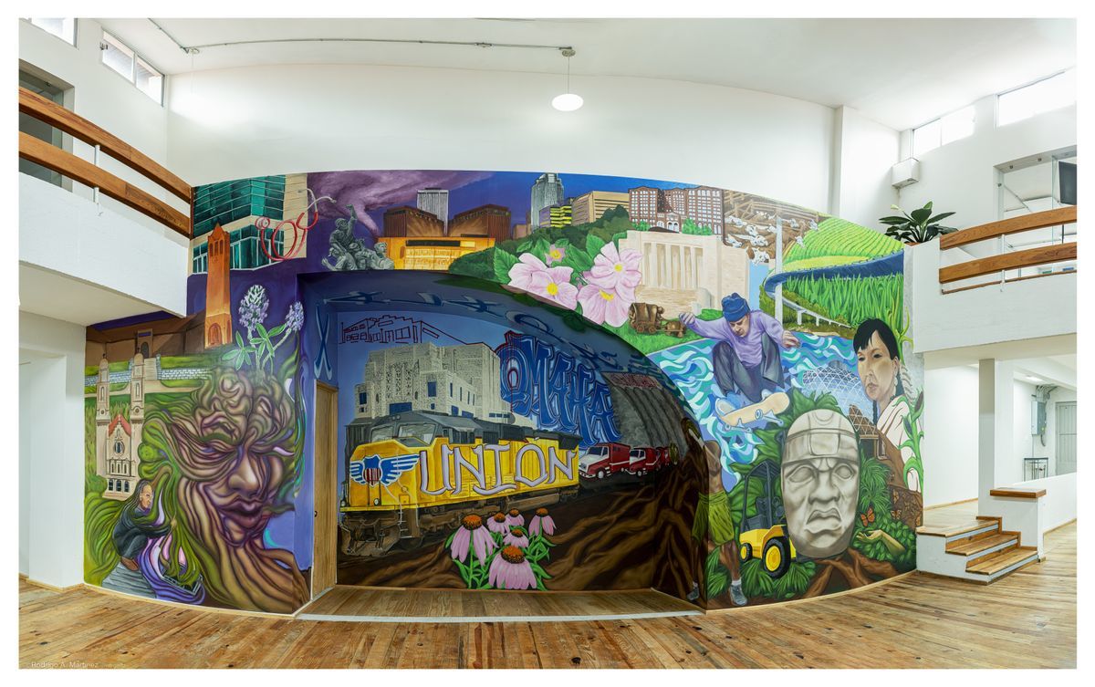 Beach with sand and ocean in distance.