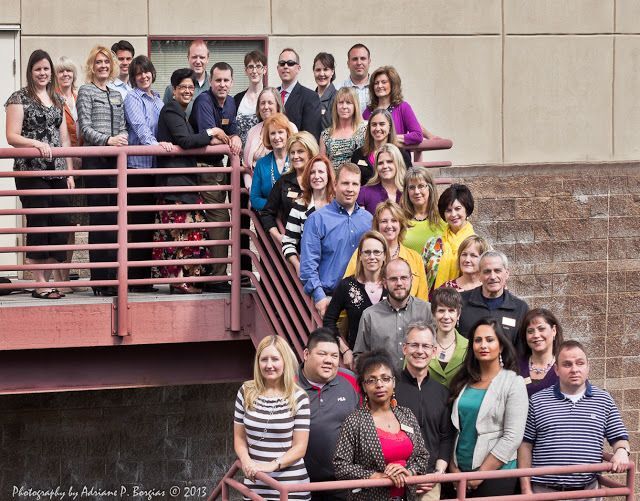 A group of people posing for a group photo
