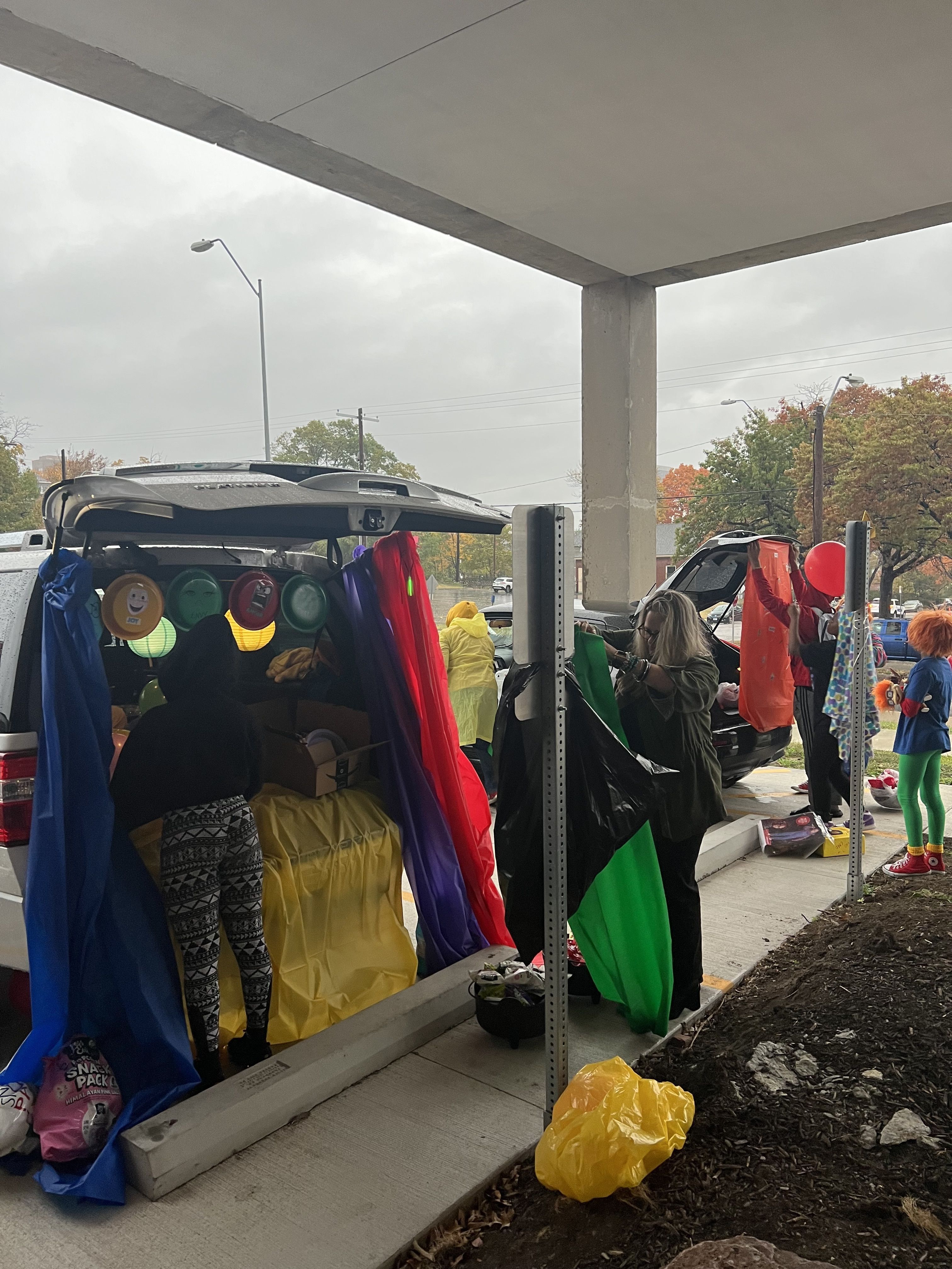 Picture is of a van decorated to represent the Pixar movie Inside Out and containing Halloween candy.