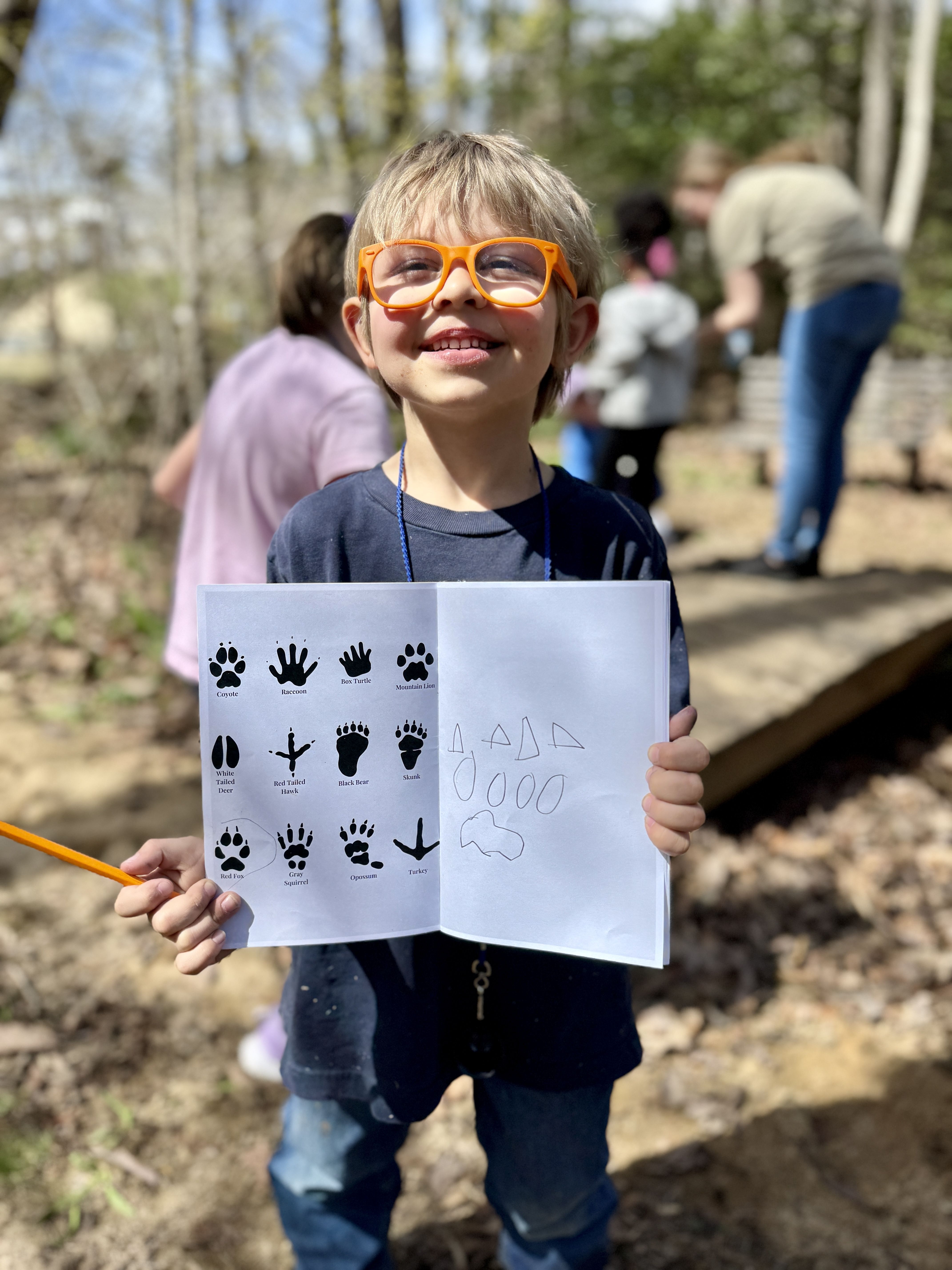 Kid With Journal