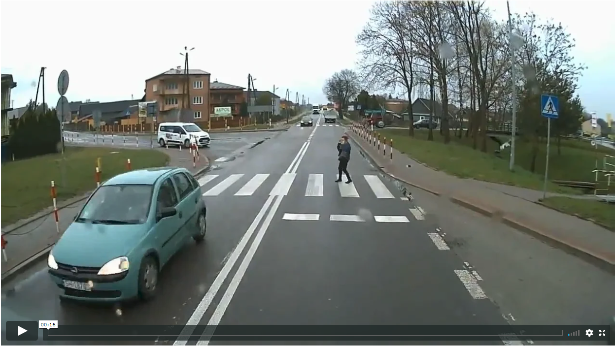 Distracted Pedestrian On Phone Steps Into Traffic