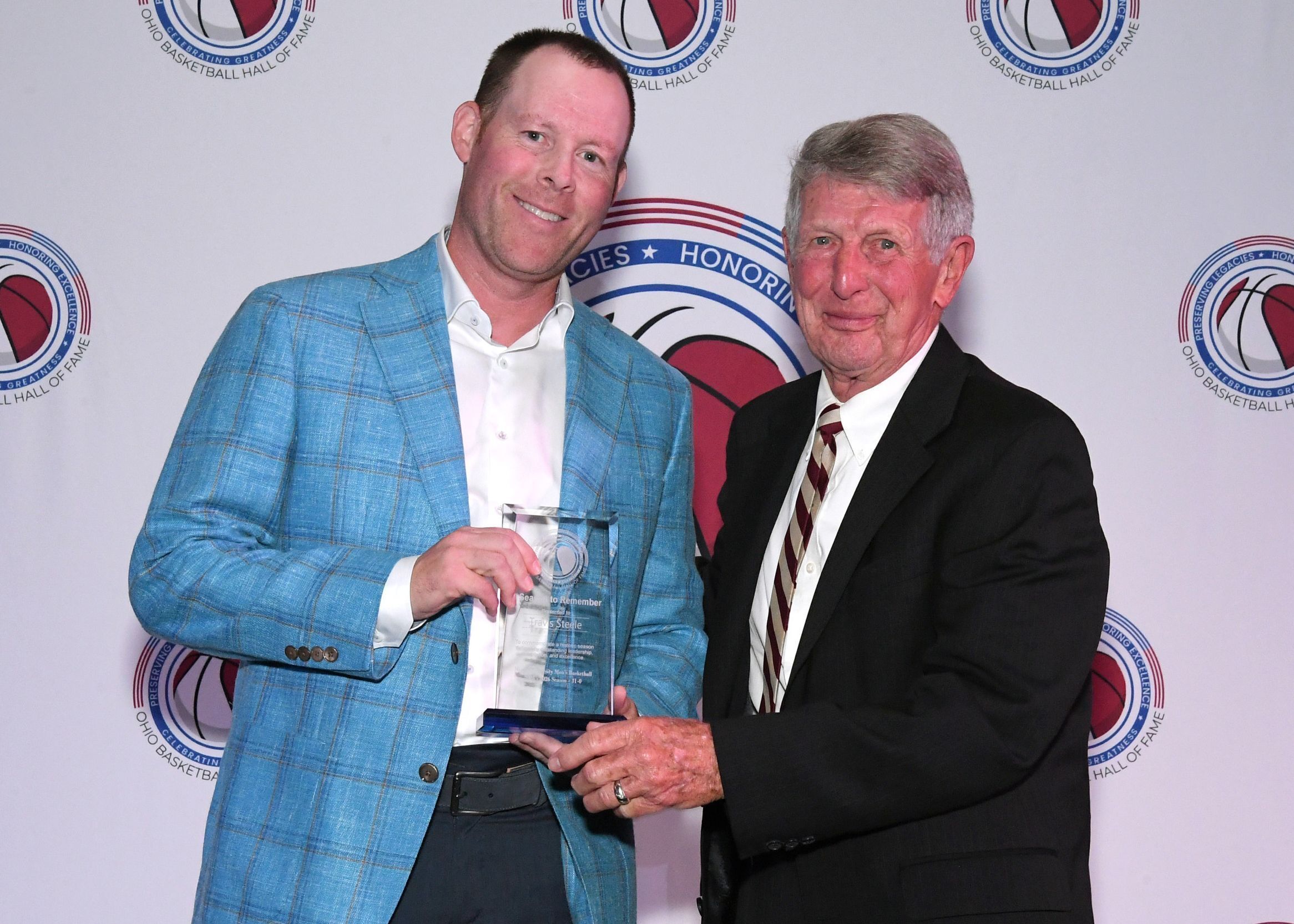 Miami University Head Coach Travis Steele with Miami basketball alumnus and OBHOF Inductee & Board Member Jim Hamilton.