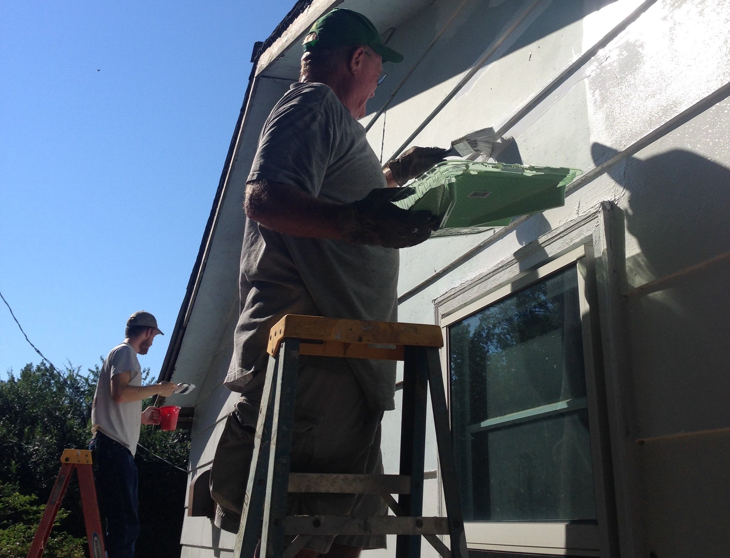 Volunteers paint home