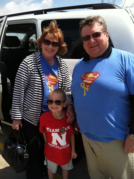 Grandpa John and Grandma Marlene with the Superhero. Do you even recognize him?!?
