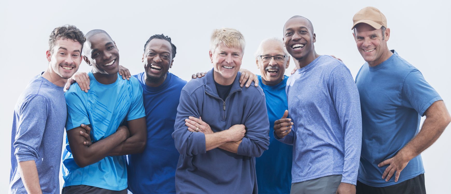 group of men smiling together