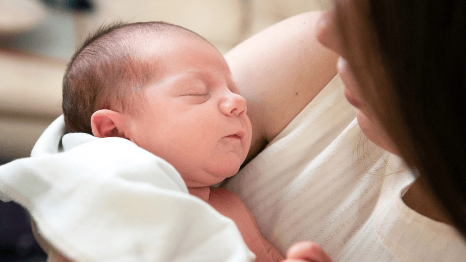 Mother holding infant 