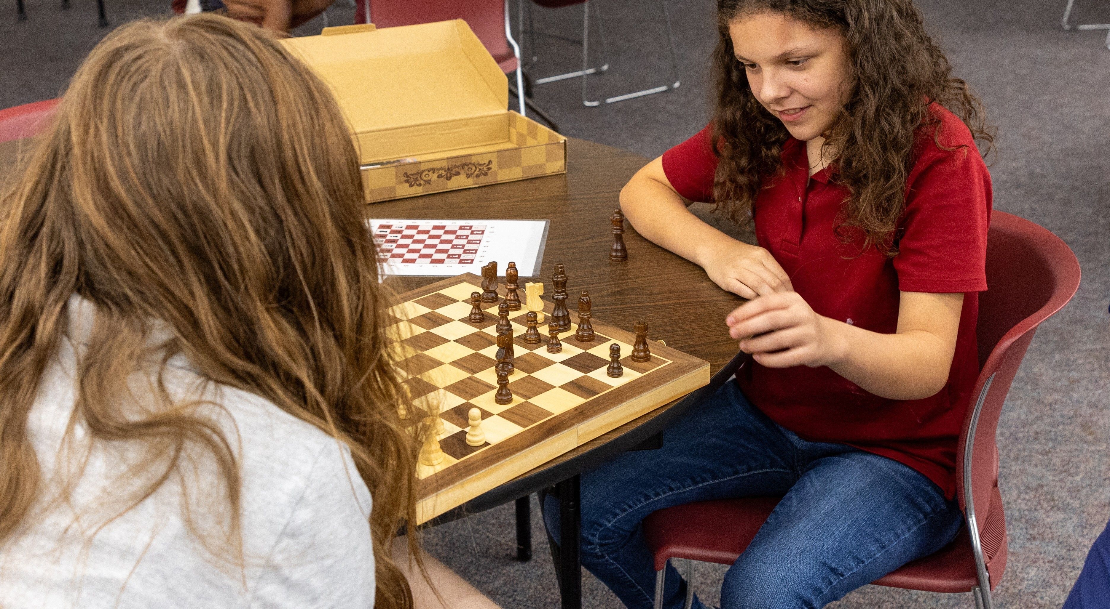 Student playing chess