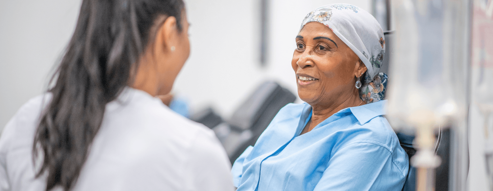 doctor comforting cancer patient