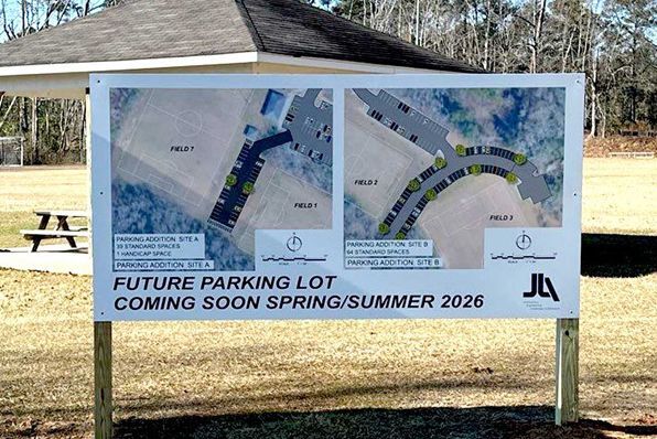 Custom ADA-compliant signs including restroom, wayfinding, and room identification signs for a medical office