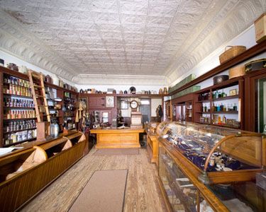 General Store interior with shelves and cases, courtesy Jim Thompson Photo