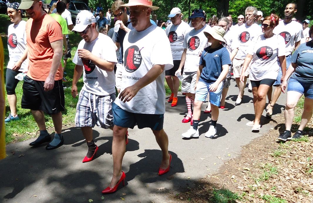 Walk a Mile in Her Shoes, an annual walk where male participants walk a mile in high heels to raise awareness about the causes and effects to men's violence against women.