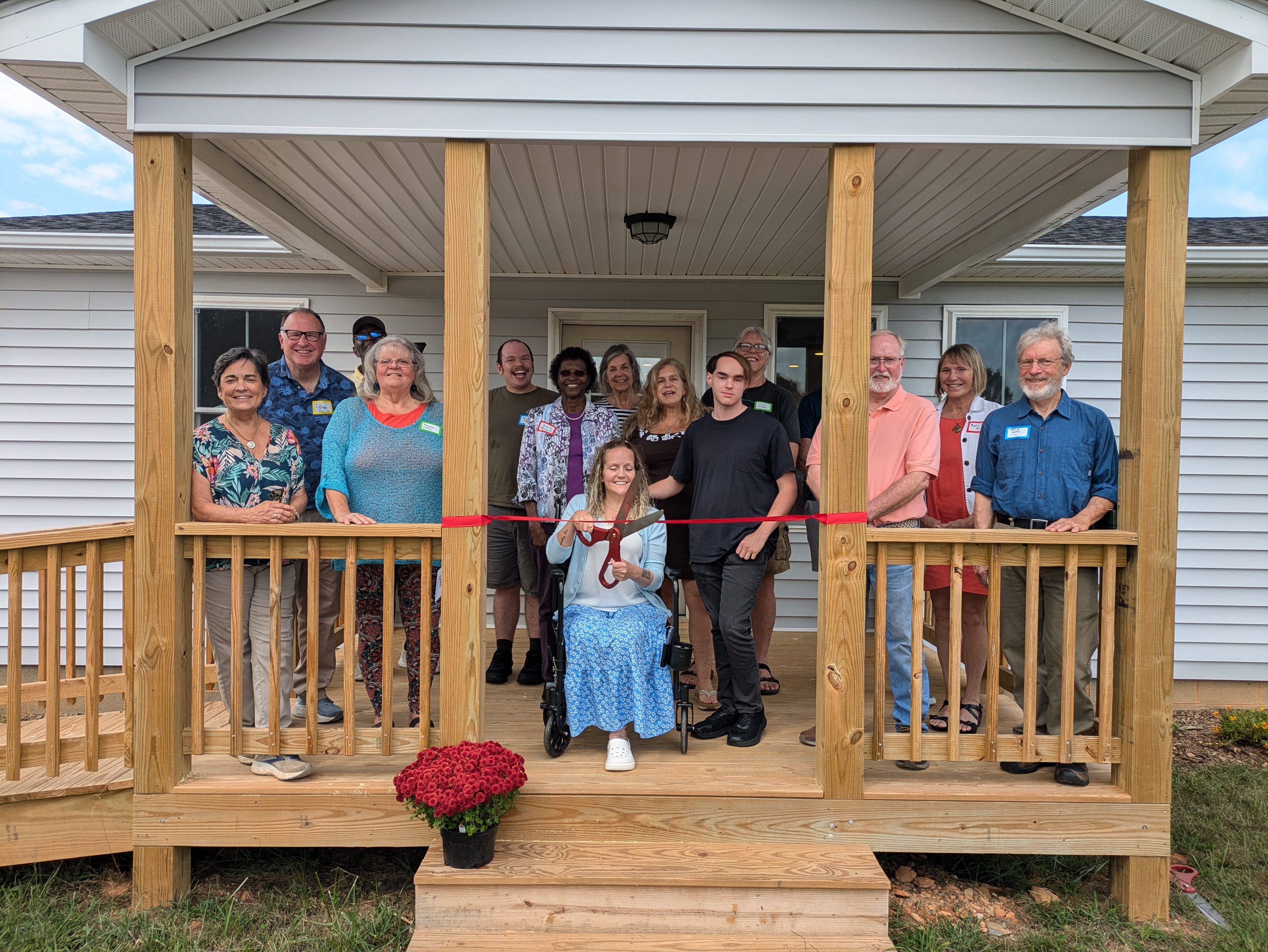 Habitat homeowner cuts ribbon on new home