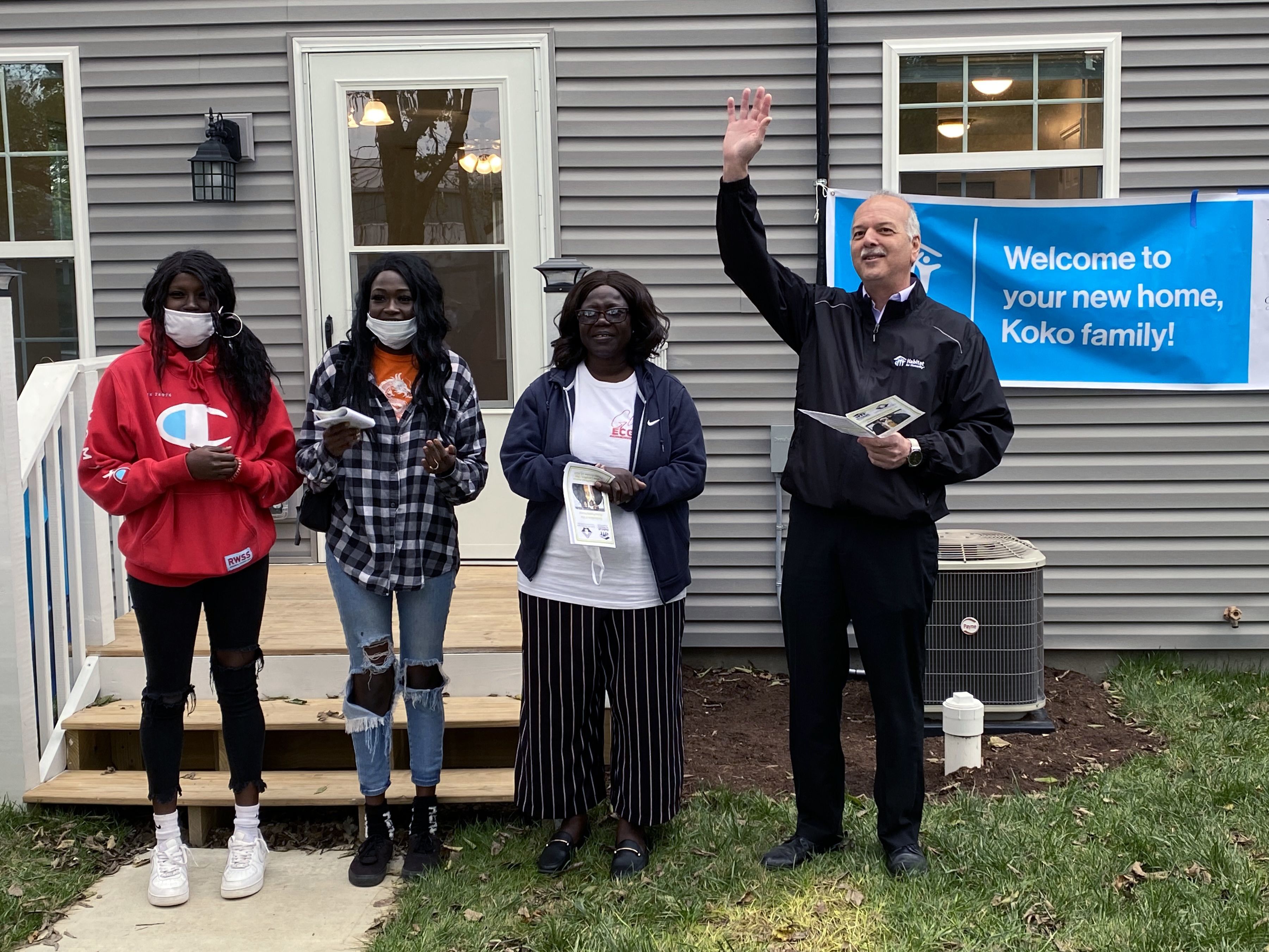 Koko family receives keys to their Habitat home.