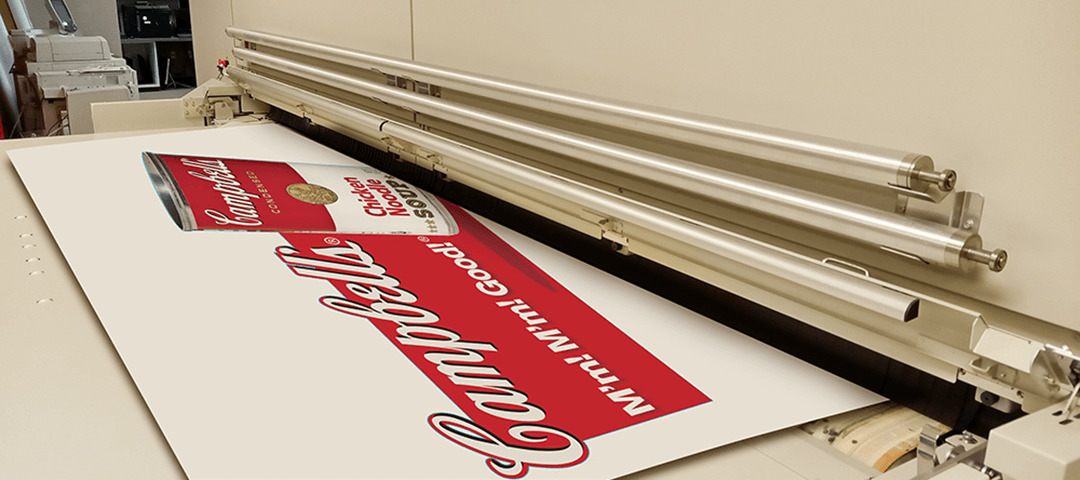 Cardboard grocery aisle end cap advertising Campbell's Soup printing on large format printer