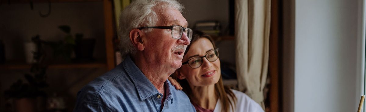 Man smiling in his independent living space