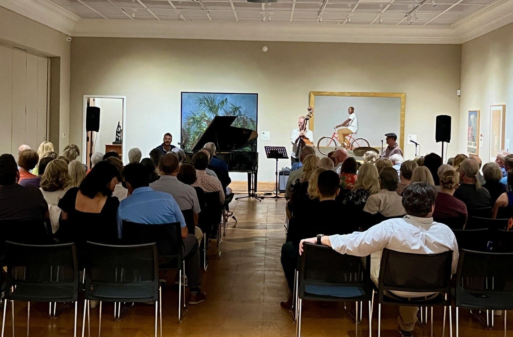 jazz musicians playing inside a museum gallery