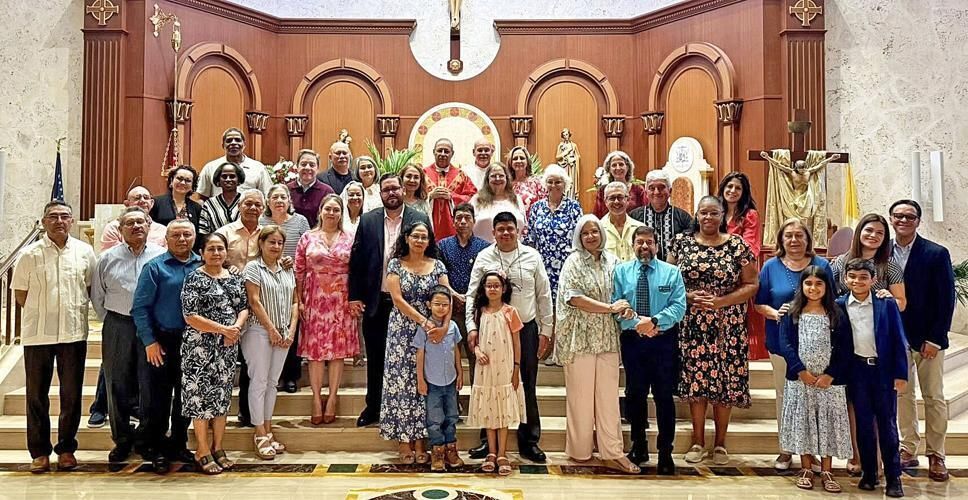 Instructors in the School of Christian Formation pose for a photo following the Mass of thanksgiving in the Cathedral of St. Ignatius of Loyola.
