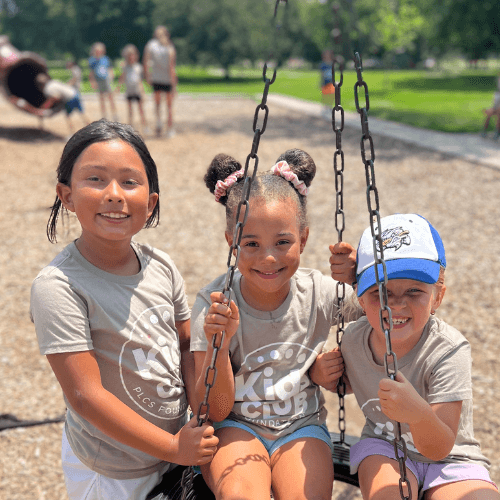 PLCS students wearing Kids Club shirts on the playground